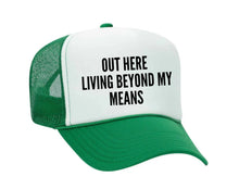Load image into Gallery viewer, Out Here Living Beyond My Means Trucker Hat
