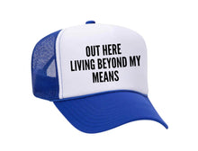 Load image into Gallery viewer, Out Here Living Beyond My Means Trucker Hat
