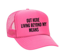 Load image into Gallery viewer, Out Here Living Beyond My Means Trucker Hat
