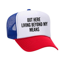 Load image into Gallery viewer, Out Here Living Beyond My Means Trucker Hat
