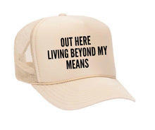 Load image into Gallery viewer, Out Here Living Beyond My Means Trucker Hat
