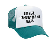 Load image into Gallery viewer, Out Here Living Beyond My Means Trucker Hat
