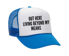 Load image into Gallery viewer, Out Here Living Beyond My Means Trucker Hat
